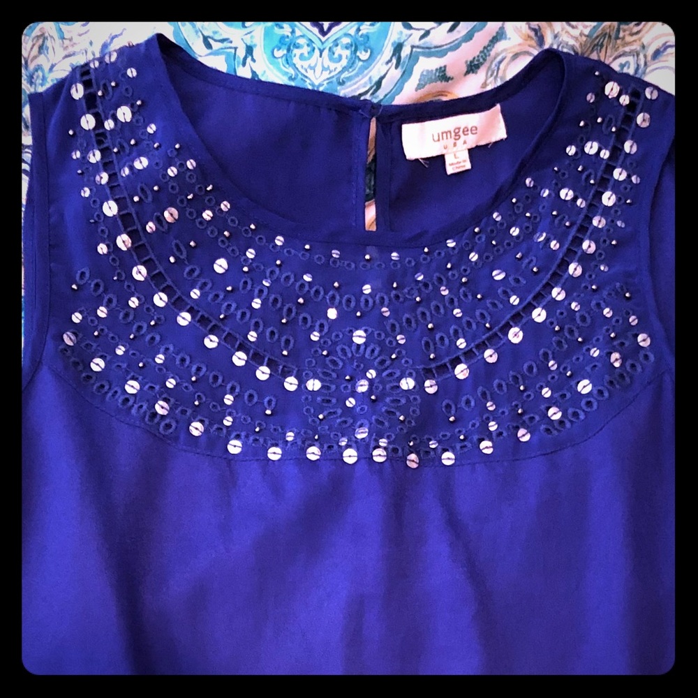 Beautiful blue boutique top with bling